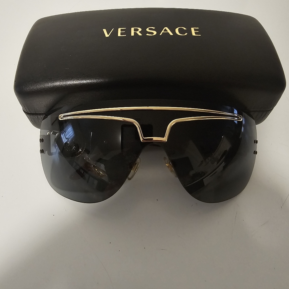 Versace Men's Sunglasses with Black and Gold Design